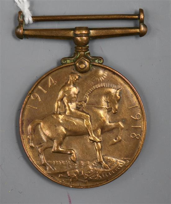 A World War I bronze War medal awarded to no.74243. Chinese L.C.
